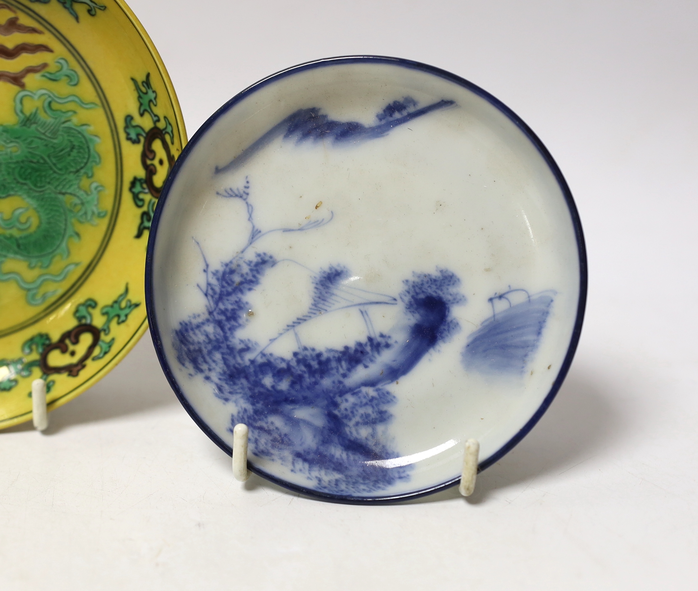 Three Chinese saucers including a ‘dragon’ example, largest 13cm in diameter